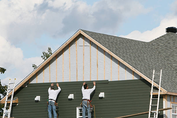 Professional Storm Damage Siding Repair technician working in Smithmill, PA